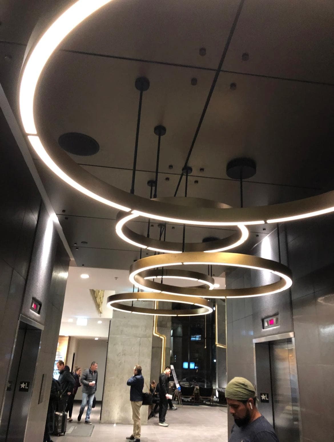 Calgary master electrician commercial lobby ring chandelier installation